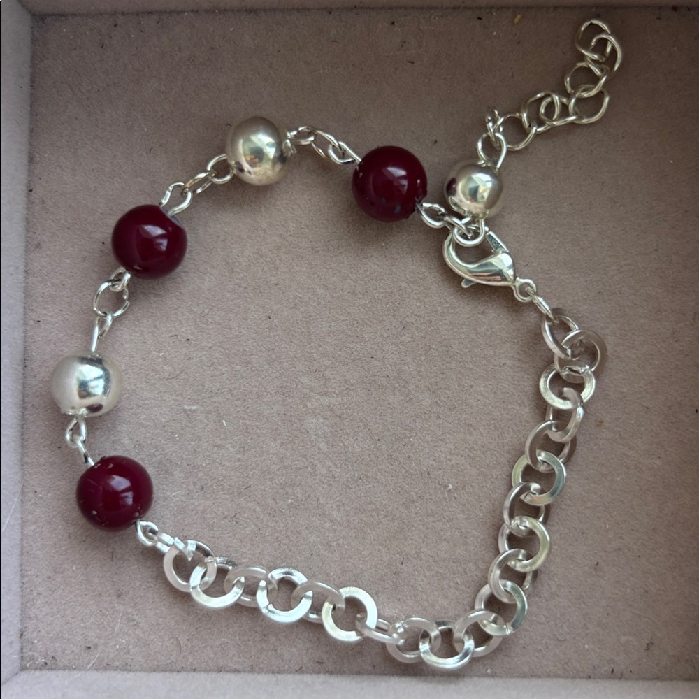 Elegant Silver and Red Beaded Bracelet
